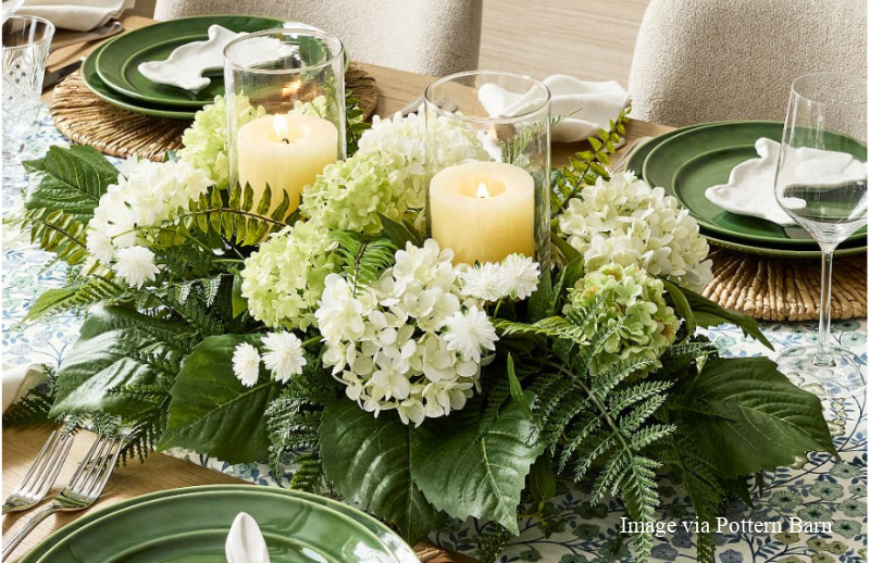 centerpiece with ferns, hydrangeas and hurricane candles - fern decorating ideas