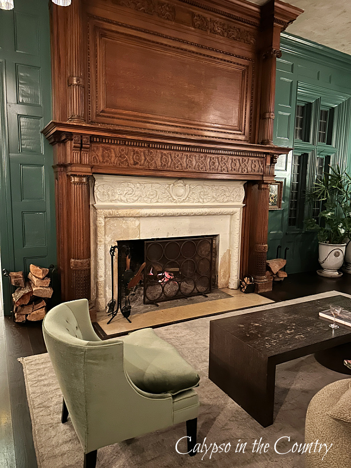 Wood fireplace mantel in lounge area