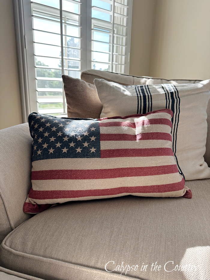 Flag pillow on chair - decorating with American flags