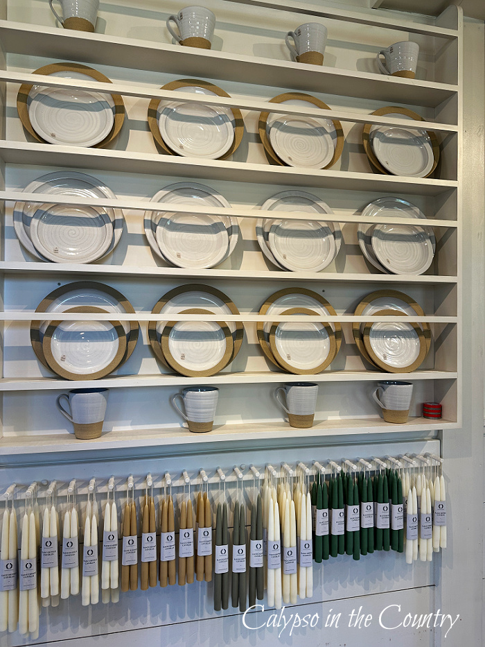 Plates and candles on wall rack - May Wrap Up