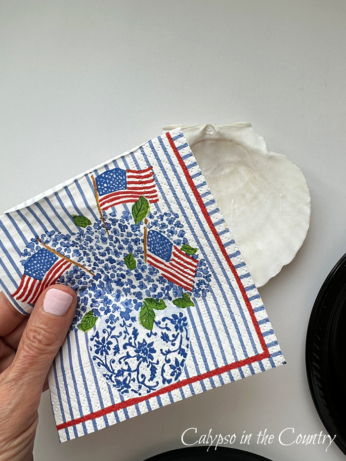 Flag cocktail napkin and shell