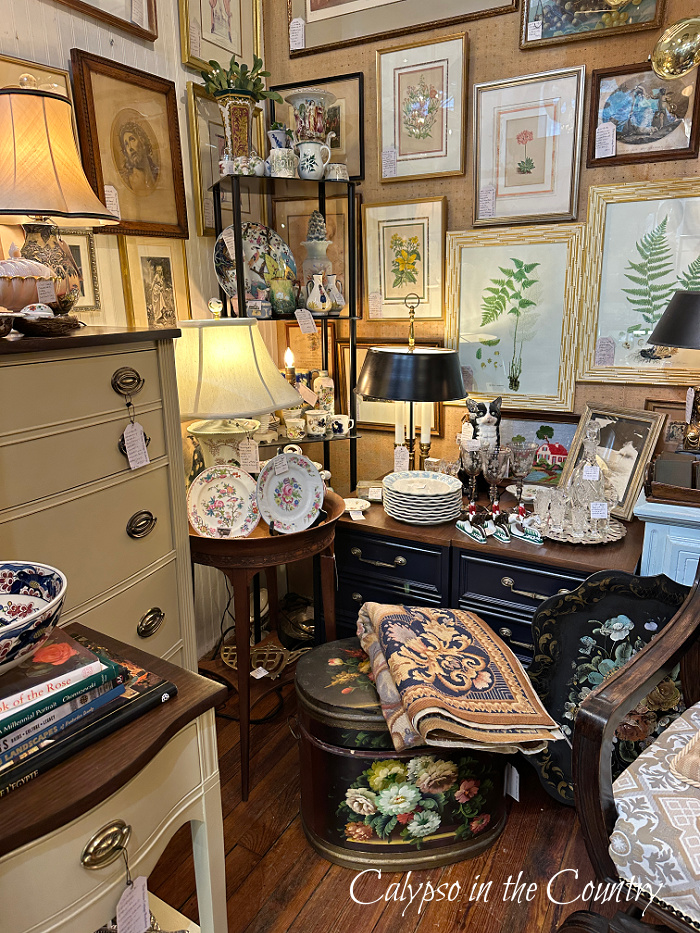 artwork, lamps and furniture at booth in antique store - June wrap up