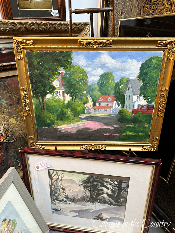 paintings displayed in antique store - August wrap up