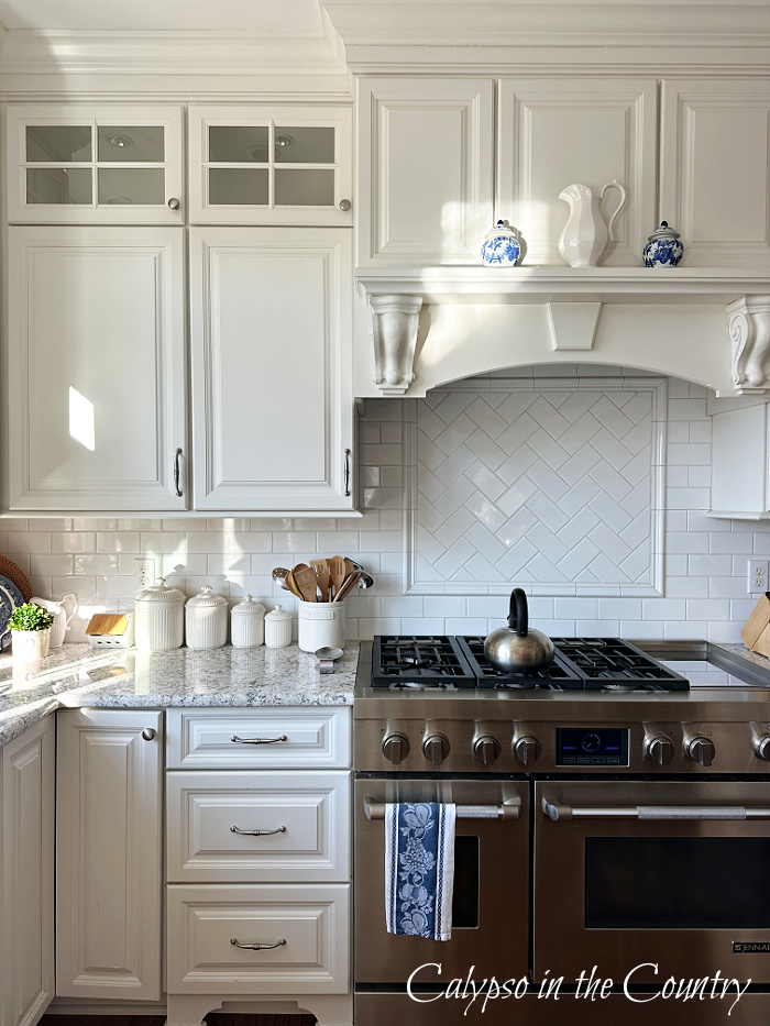 White kitchen in morning sunlight - August wrap up